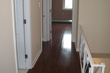 02firedamagerepairhallway01b